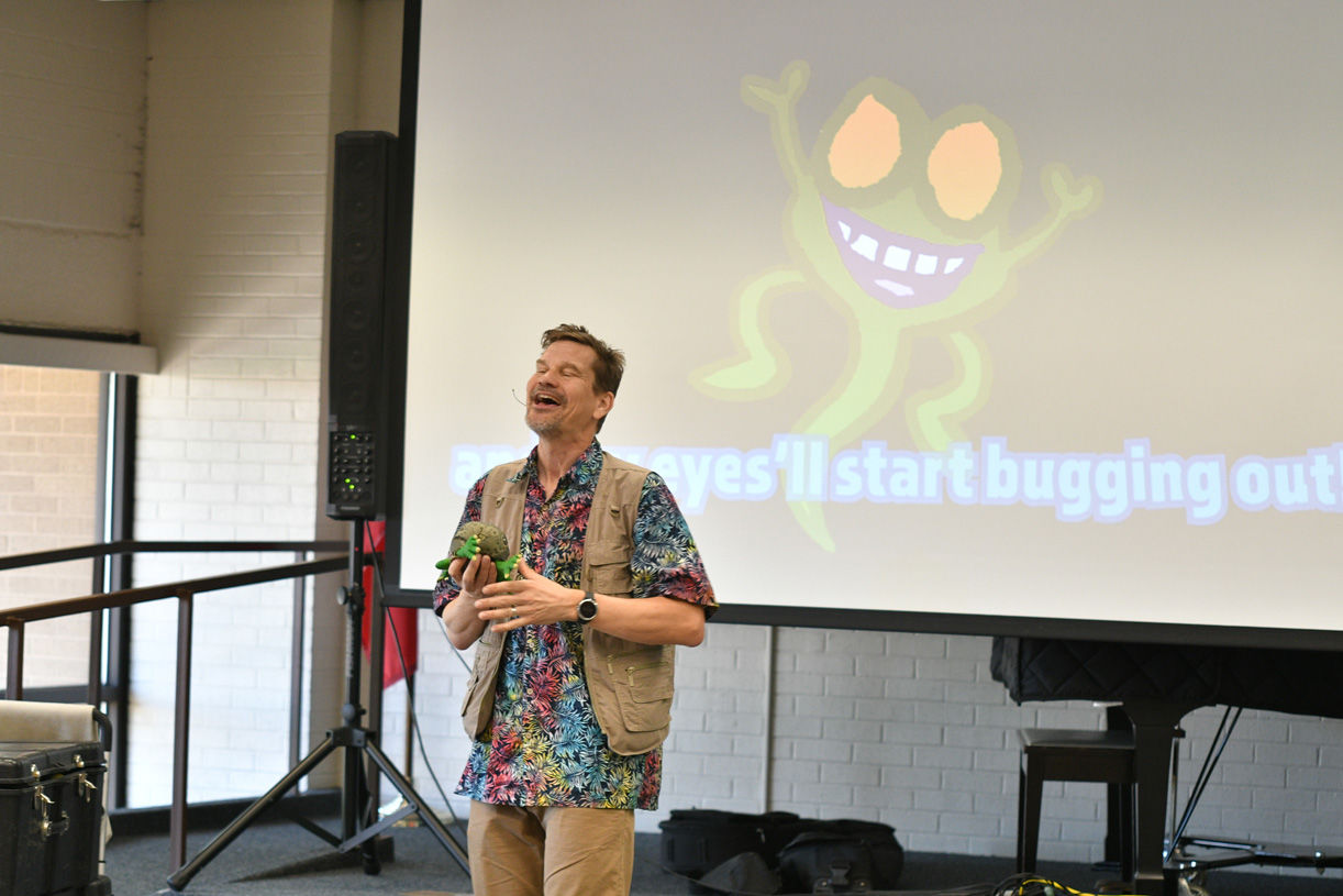 Singing zoologist Lucas Miller visits Bryan library